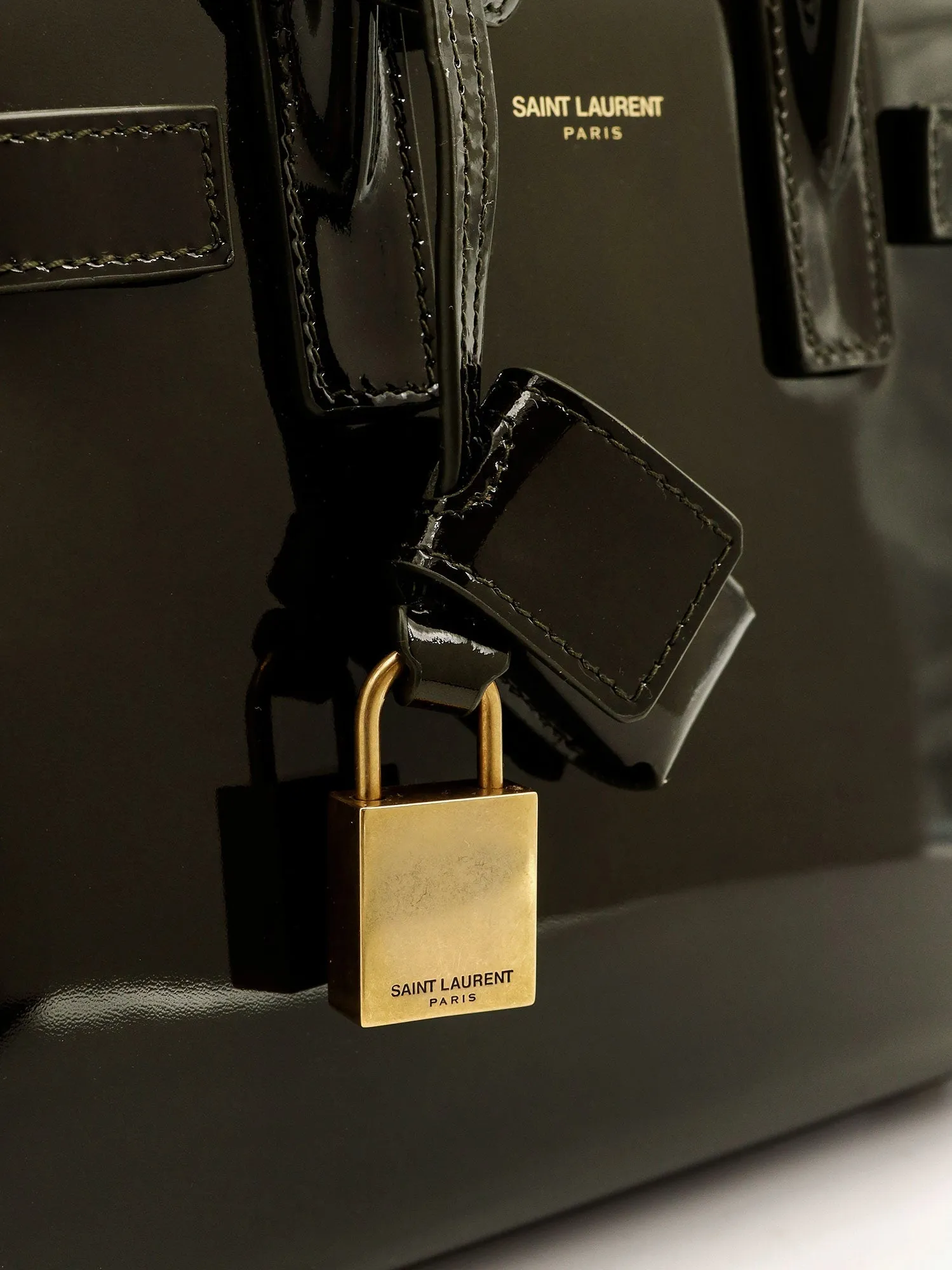 Saint Laurent Sac De Jour Nano Patent Leather Handbag With Metal Padlock